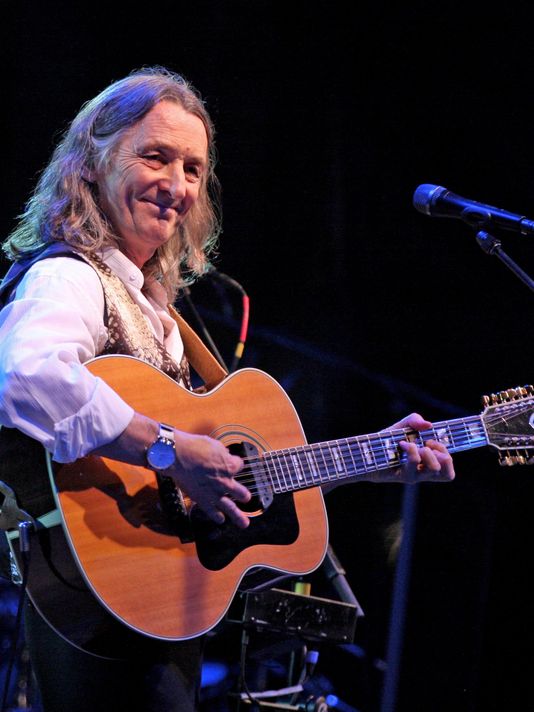 Supertramp lead-singer Roger Hodgson entertains a large Friday night crowd at the Blue Ash Town Square main stage. His composition "Give a Little Bit" was a mega-hit in 1977.